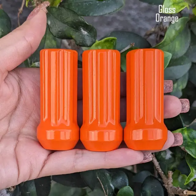 Set of 32 premium 14×1.5mm 7-spline lug nuts, each 2 inches tall, featuring durable powder-coated finish and including two custom-fit key sockets for secure, hassle-free installation. - Image 13