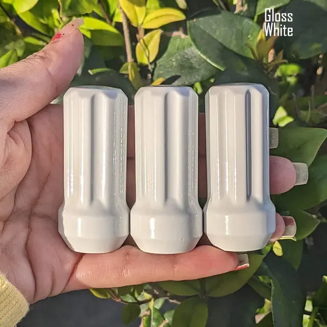 Set of 32 premium 14×1.5mm 7-spline lug nuts, each 2 inches tall, featuring durable powder-coated finish and including two custom-fit key sockets for secure, hassle-free installation. - Image 17