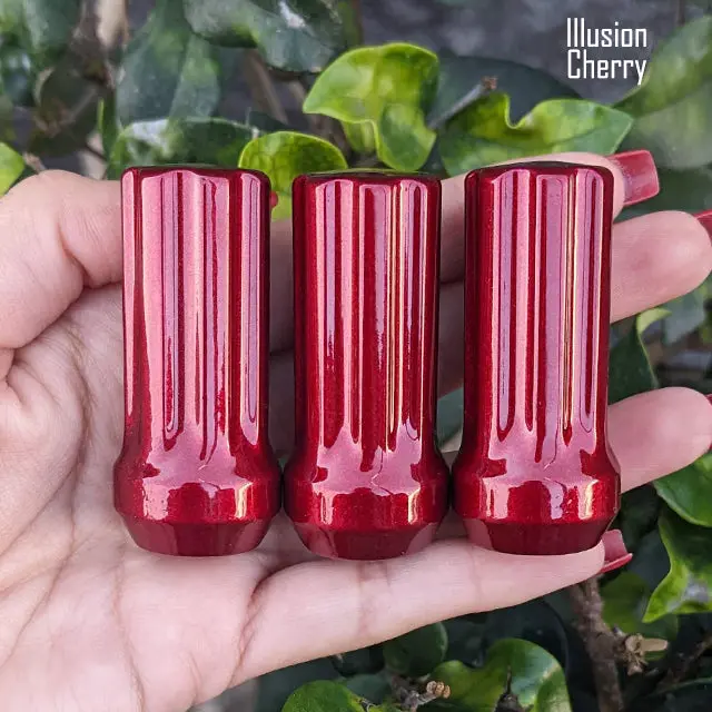 Set of 32 premium 14×1.5mm 7-spline lug nuts, each 2 inches tall, featuring durable powder-coated finish and including two custom-fit key sockets for secure, hassle-free installation. - Image 19