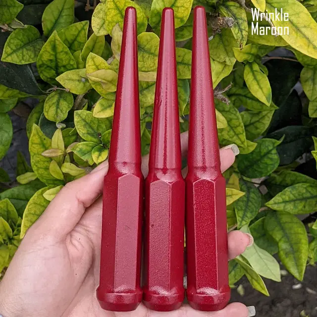 Set of 20 high-strength spike lug nuts with 9/16"-18 thread pitch, 6-inch length, durable powder-coated finish, and vibrant color options for custom wheel styling. - Image 78